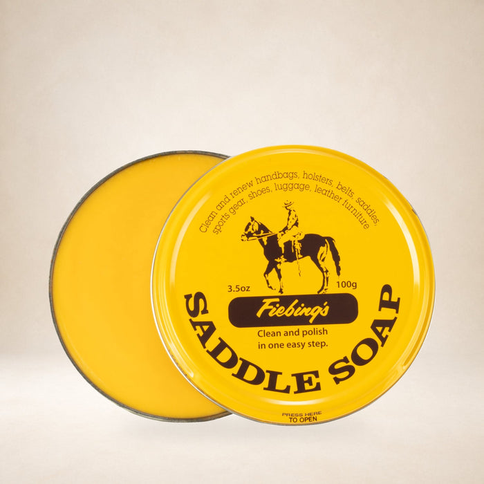 Fiebing's Yellow Saddle Soap 3.5 oz on a warm studio background