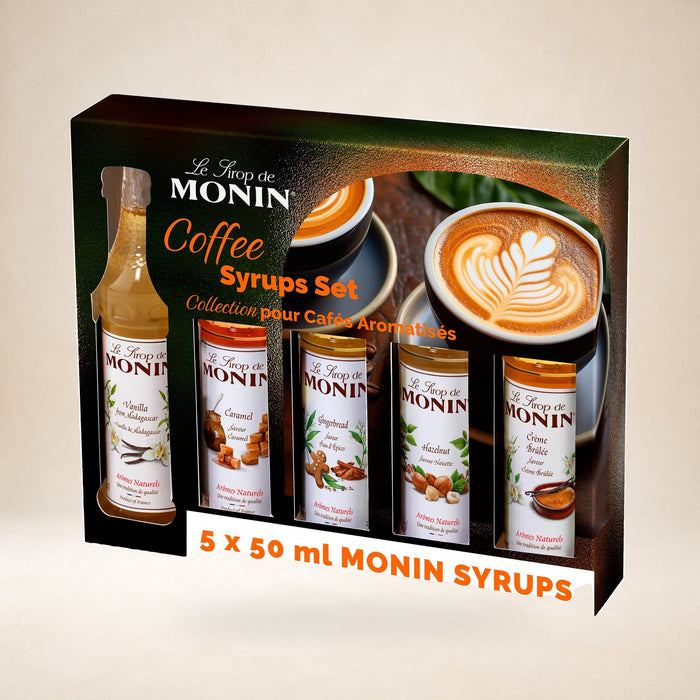 MONIN Premium Chai Tea Concentrate 700ml for Chai and Cocktails. Vegan-Friendly, Allergen-Free, 100% Natural Extracts and Colourings on a warm studio background