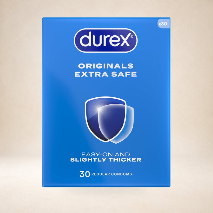 Durex Extra Safe Condoms, 30 Condoms (1 Pack) (Packaging May Vary) on a warm studio background