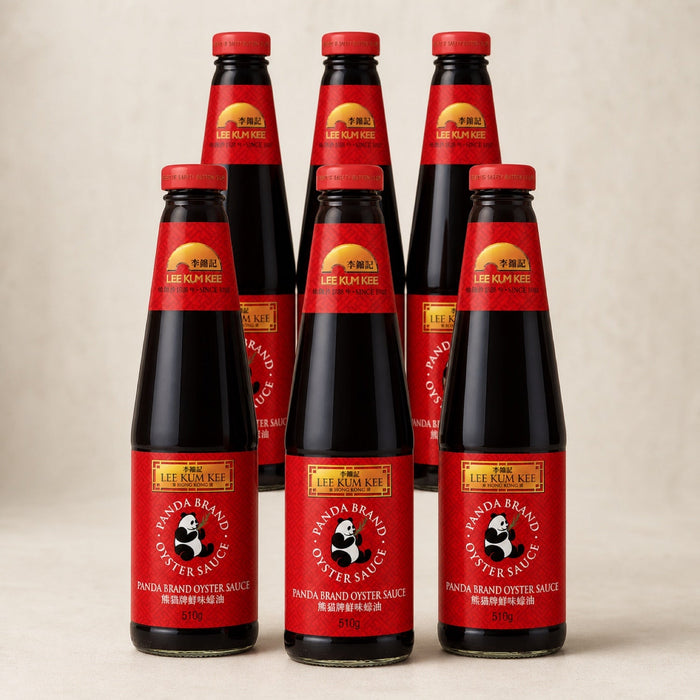 Lee Kum Kee Panda Brand Oyster Sauce 510g, pack of 6, on a warm studio background