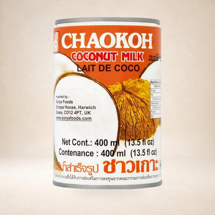 Chaokoh Coconut Milk 400ml on a warm studio background
