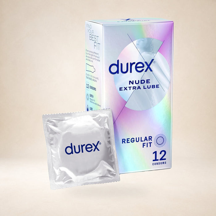 Durex Nude Extra Lube Condoms, 12 Pack on a warm studio background