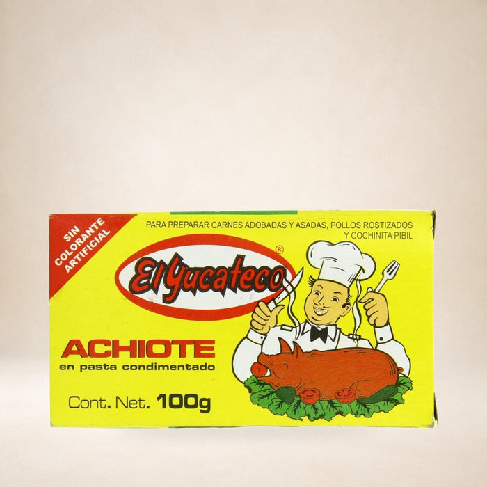 El Yucateco Achiote Paste 100g on a warm studio background