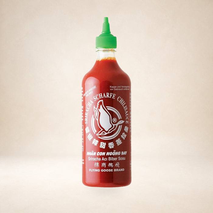 Flying Goose Original Sriracha Chilli Sauce 730ml on a warm studio background