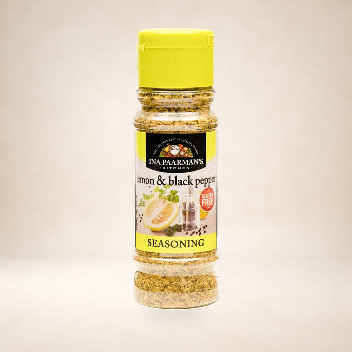 Ina Paarman Lemon & Black Pepper 200g on a warm studio background