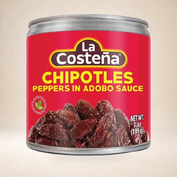 La Costeña Chipotle Peppers in Adobo Sauce 199g on a warm studio background