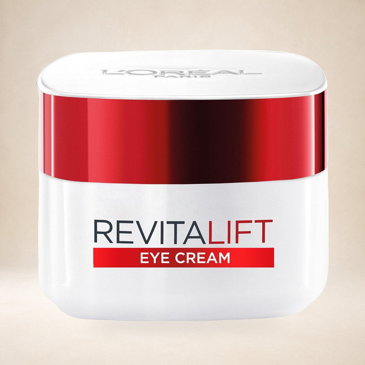 L'Oréal Paris Revitalift Eye Cream 15ml on a warm studio background