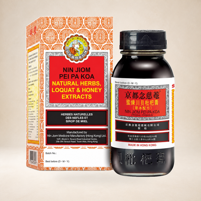 Nin Jiom Pei Pa Koa Cough Syrup 150ml on a warm studio background