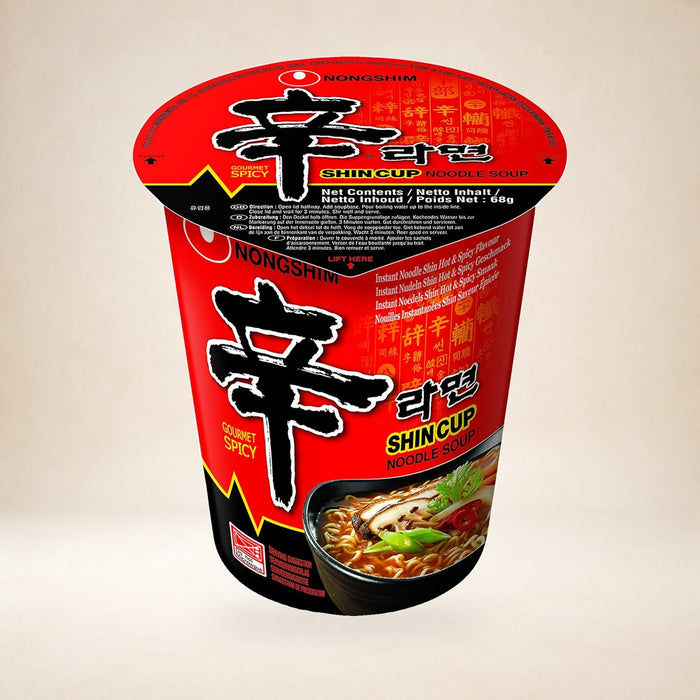 Nongshim Shin Noodle Soup Cup 68g on a warm studio background