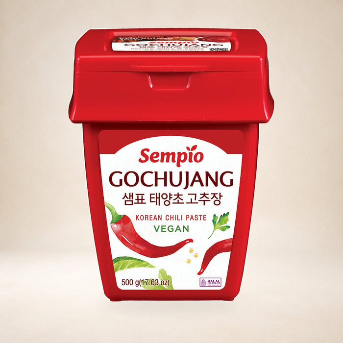 Sempio Korean Hot Pepper Gochujang Paste 500g on a warm studio background