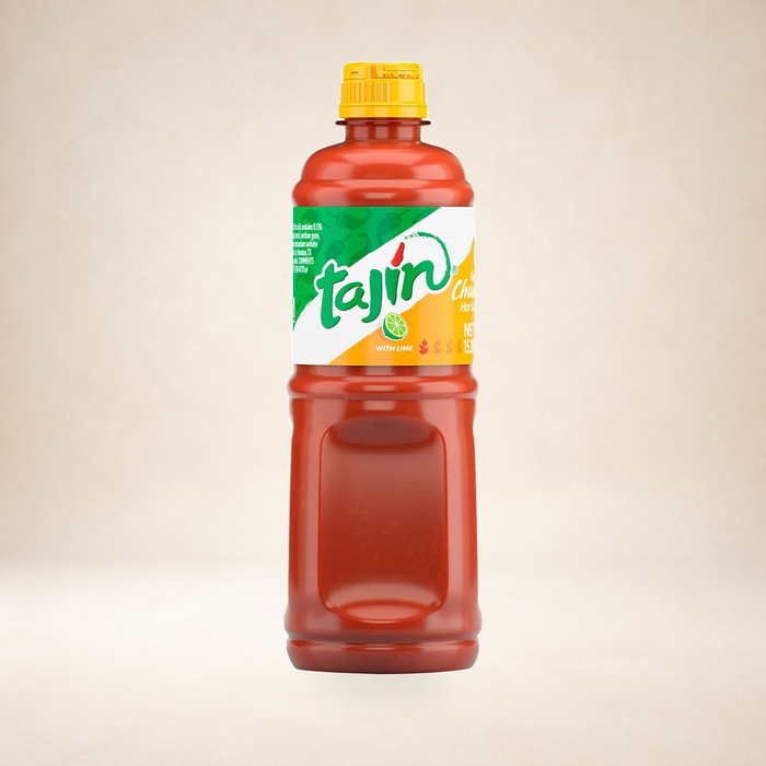 Tajín Chamoy Sauce 455ml on a warm studio background