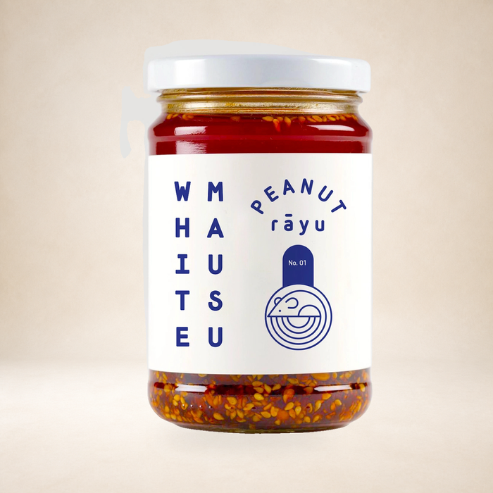 White Mausu Peanut Rayu 240g on a warm studio background